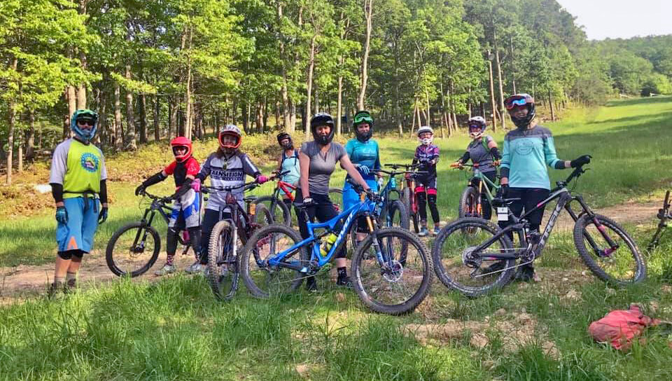 A group of guests in the Ƶ Mountain Bike Park